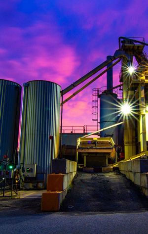 close up of a factory at night